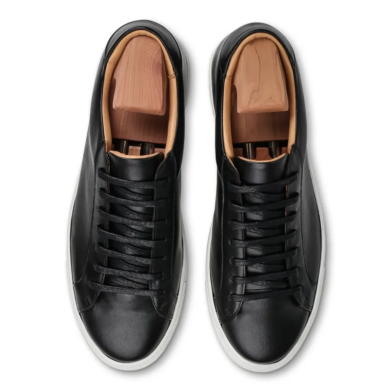 Skolyx Premium sneaker in black leather with white sole