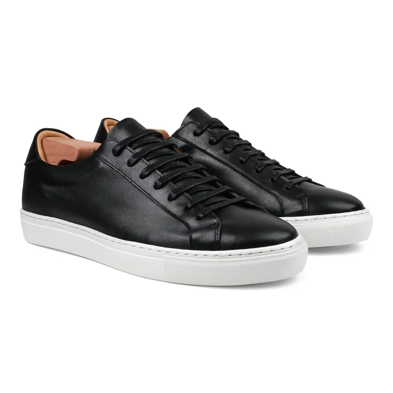 Skolyx Premium sneaker in black leather with white sole