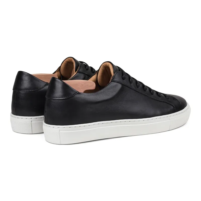 Skolyx Premium sneaker in black leather with white sole